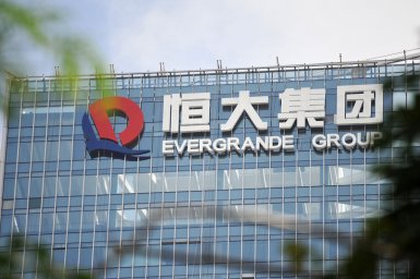 Китайский девелопер Evergrande совершил первую выплату по обязательствам